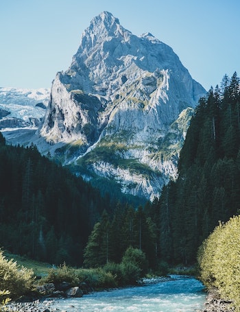 Dramatic Swiss mountain peak at sunrise