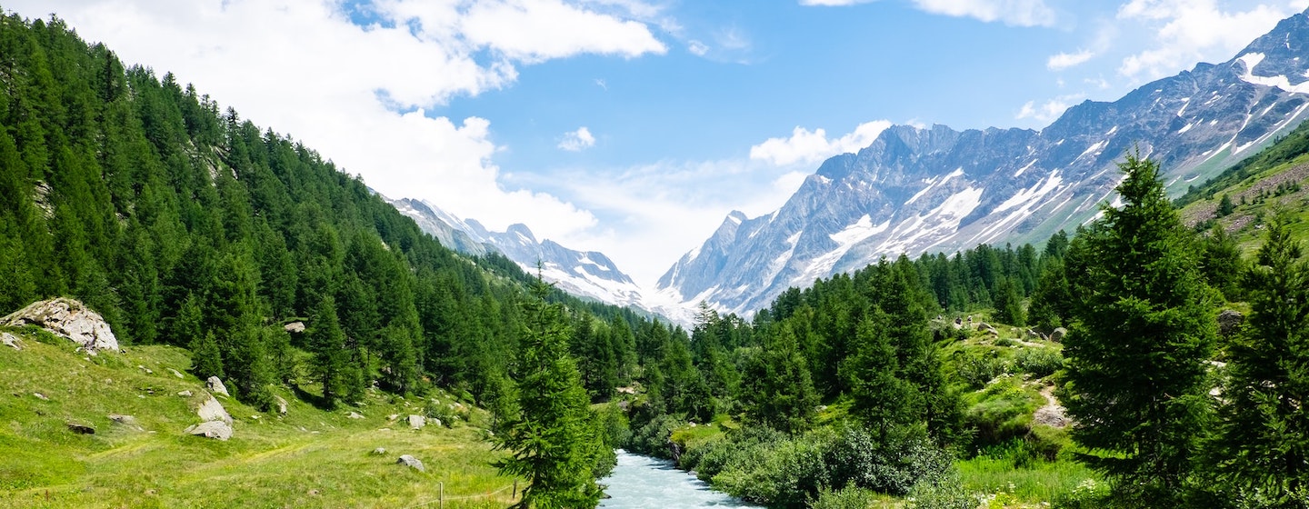 Beautiful Swiss valley with mountains and river